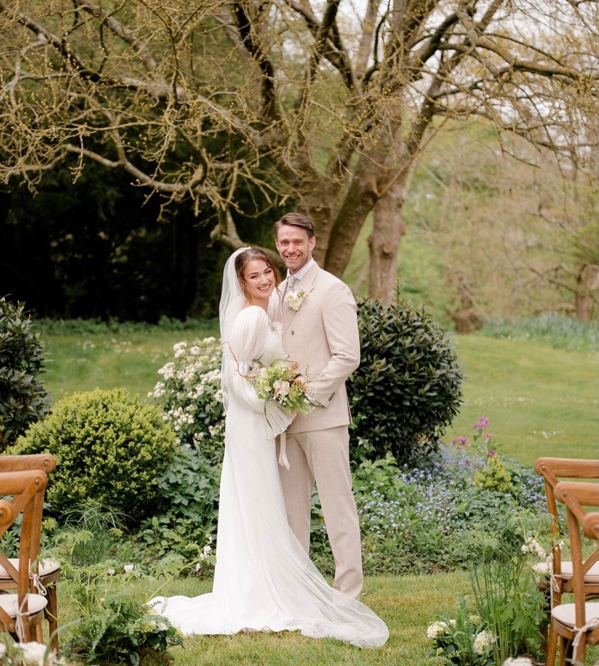Florist arranging wedding flowers